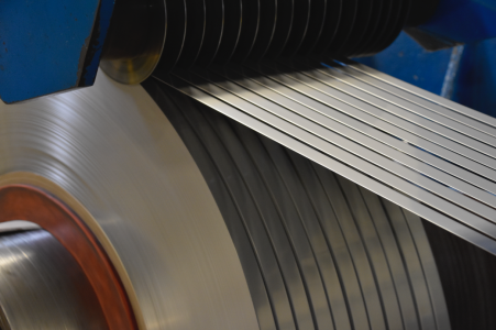 301 stainless steel coil being cut by a metal slitting machine